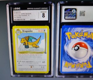Dragonite CGC 8 Pokemon Spanish Black Star Promo