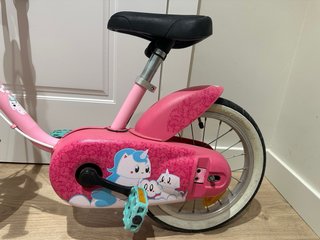 Bici niña rosa con ruedines