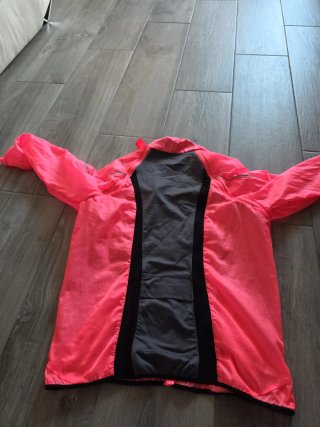 Cortavientos convertible chaleco fuxia