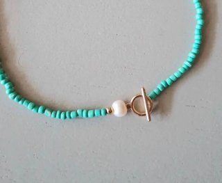 Collar turquesa con perla de río