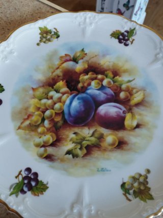 Juego de 2 platos decorativos de porcelana