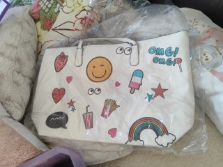 Bolso blanco con dibujos divertidos