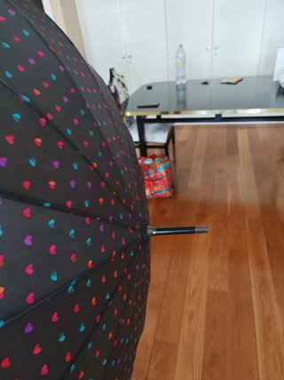 Paraguas automático negro y multicolor
