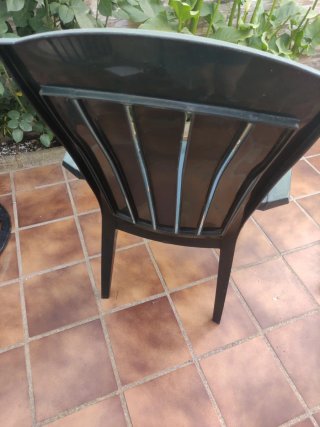 Sillón de jardín de plástico verde