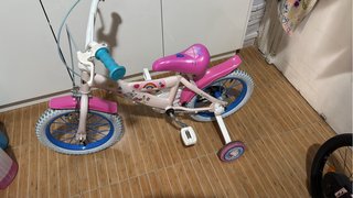 Bicicleta infantil rosa con ruedas de 16