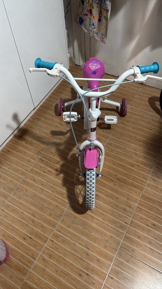 Bicicleta infantil rosa con ruedas de 16