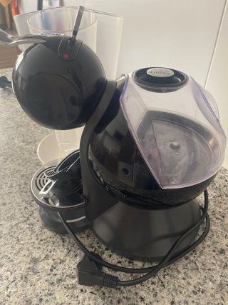 Cafetera Dolce Gusto regalo de dispensador de caps