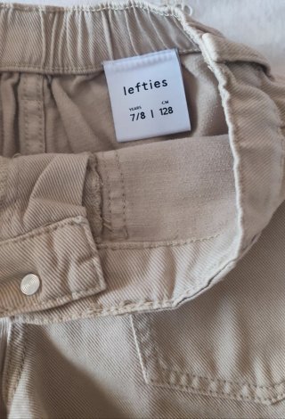 Lote 2 Pantalónes cortos beige, blanco, talla 7/8