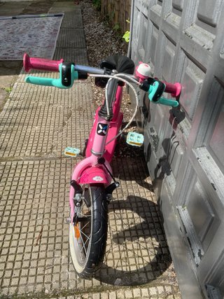 Bicicleta infantil rosa con unicornio