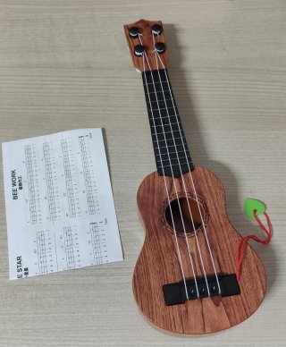 Mini Ukulele Giocattolo per Bambini e Principianti