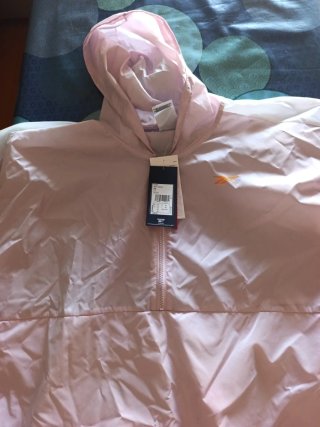 Chubasquero Reebok rosa