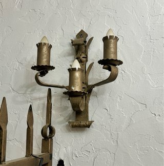 3 Lámpara de forja y 11 candelabros.
