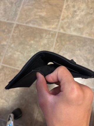 Portafoglio nero con zip e porta carte