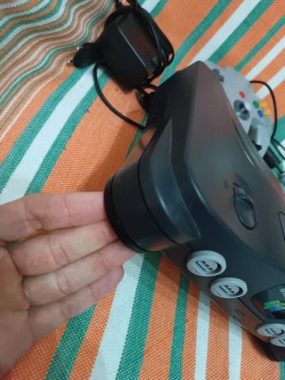 Nintendo 64 con juegos Zelda y Mario y otros