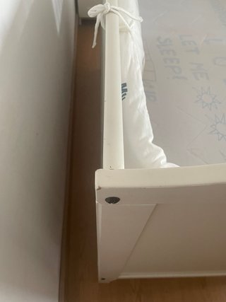 Cuna de madera con colchón