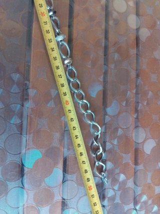 Collana in acciaio con ciondoli