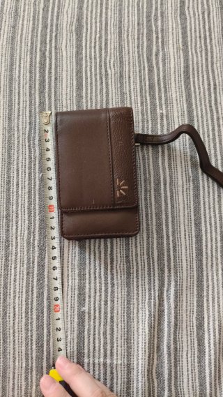 Funda/billetera de cuero marrón