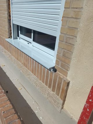Colocación mármol y ventanales