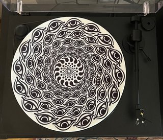 Tappetino per giradischi con design a spirale occhi