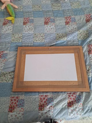 Cuadro punto de cruz querubines hecho a mano