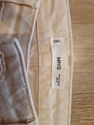 Pantalones campana Mango color beige