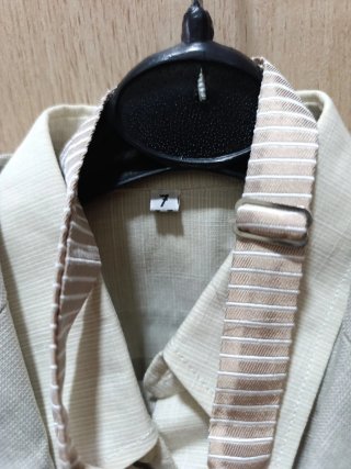 Traje de niño beige