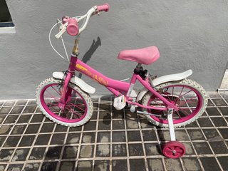 Bicicleta niña 16 con ruedines.