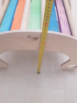 Balancín de madera arcoíris