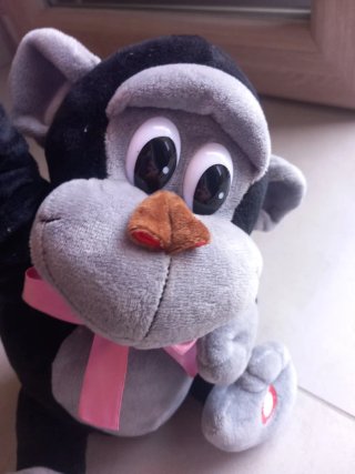 Peluche scimmia rosa