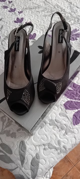 Bolso de fiesta plateado con pedrería