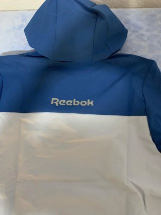 Cortavientos Reebok Azul y Blanco