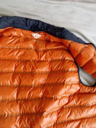 Chaleco acolchado hombre azul y naranja