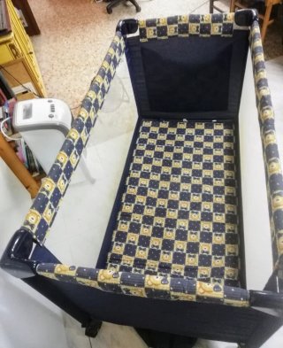 Cuna madera y plástico