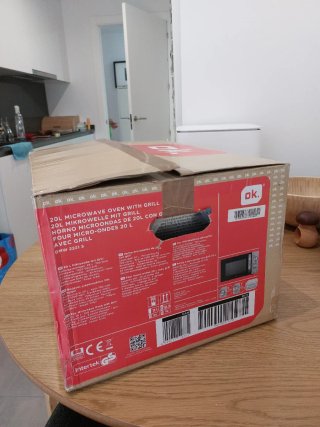 Horno Microondas plateado de 20 litros con grill