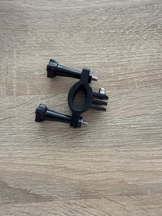 Correa y accesorio para cámaras