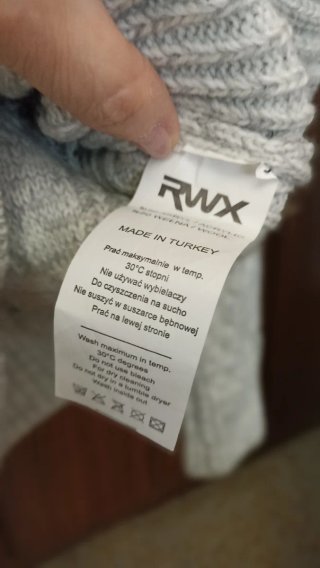 Jersey RWX cuello alto con cremallera y hebillas