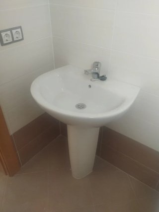 Lavabo de porcelana blanco