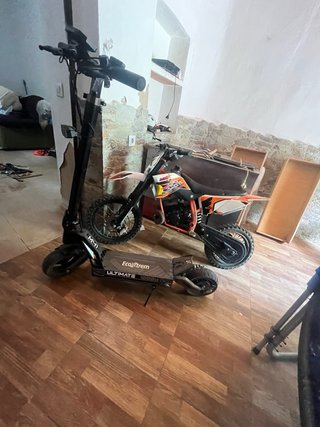 Moto de cross 49cc naranja y blanca