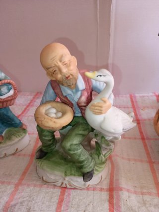 Figuras de porcelana de pareja de ancianos