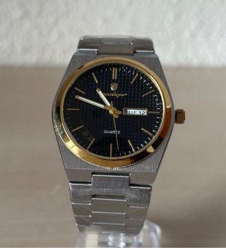 Reloj Poedagar Hombre Oro y Plata
