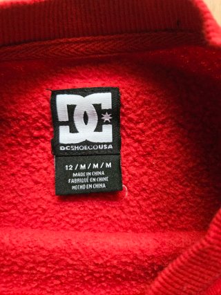 Sudadera DC Shoes bicolor roja y negra niño