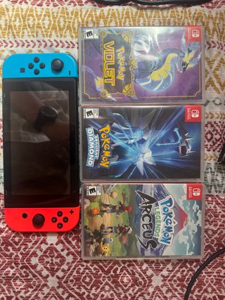 Nintendo Switch + Juegos Físicos