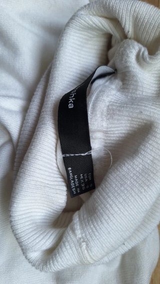 Jersey cuello alto elegante blanco