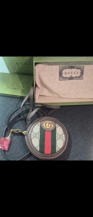Monedero Circular Gucci GG Supreme