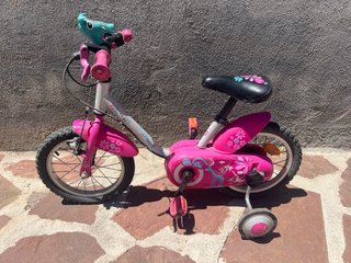 Bicicleta infantil Btwin rosa con ruedines