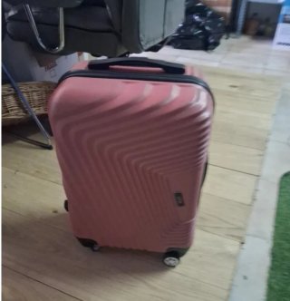 Maleta de viaje rosa