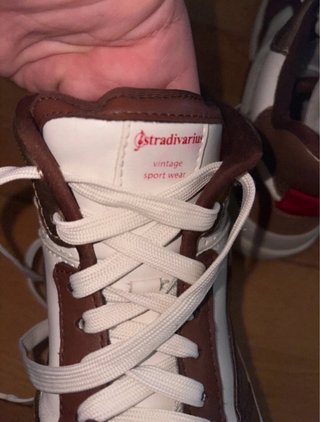 Zapatillas deportivas altas marrones y blancas