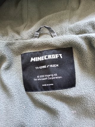 Abrigo niño gris y verde talla 11-12.en buen estad
