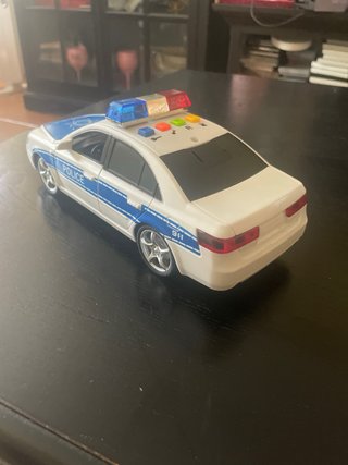 Coche de policía de juguete con luces y sonidos