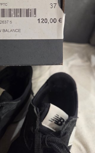 Zapatillas New Balance Negras y Blancas